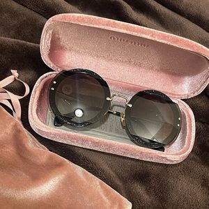 Miu miu round Sunglasses